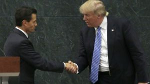 Trump advierte a Peña Nieto sino paga muro cancelará reunión