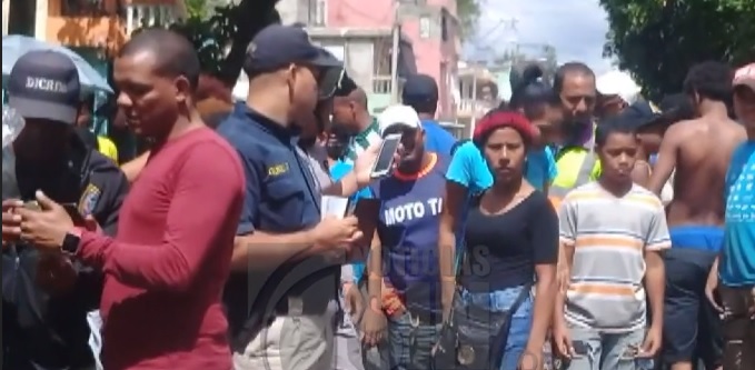 Al menos un muerto y un herido en tiroteo en barrio Guachupita, de SD imagen