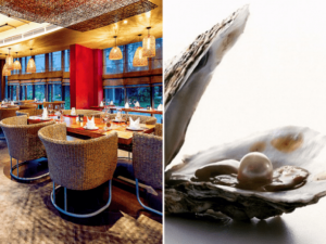 Hombre encuentra valiosa perla comiendo ostras en un restaurante Hombre encuentra valiosa perla comiendo ostras en un restaurante