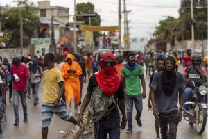 HAITI: Sigue caos; crece polémica sobre envío fuerza internacional