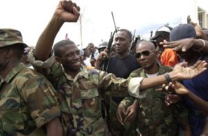 HAITI: Rebelde Guy Philippe llama pueblo tomar las armas